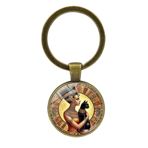Vintage bronze Egyptian Queen and Black Cat keychain with glass dome pendant