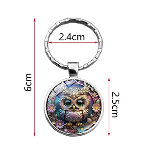 Exquisite owl pendant keychain with colorful floral pattern and dimensions shown