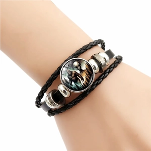 Retro multi-layer woven leather bracelet featuring a Bigfoot glass cabochon charm