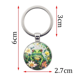 Portachiavi creativo con ciondolo in vetro con rana e loto e anello in metallo