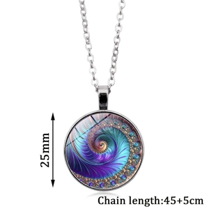 Macro view of 25mm glass pendant with colorful Fibonacci spiral and silver chain
