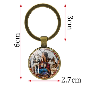Vintage bronze keychain featuring native woman and wolf art pendant, 6cm total length
