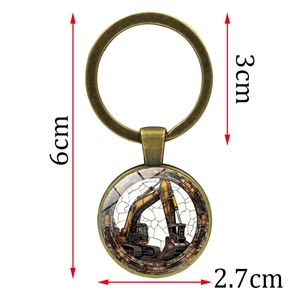 Porte-clés excavatrice vintage en bronze avec dimensions détaillées pour accessoire mode