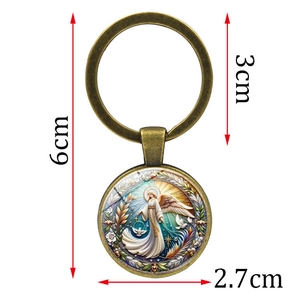 Antique bronze angel and dove pendant keychain with detailed 2.7cm circular charm