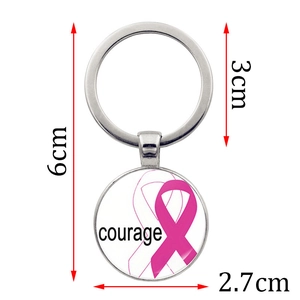 Portachiavi con nastro rosa e ciondolo in vetro con scritta courage e anello d argento