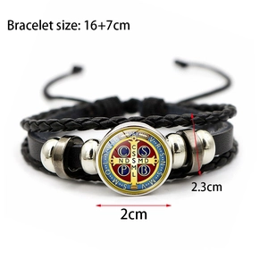 Luminous Saint Benedict medal multilayer woven leather bracelet for a vintage punk style look