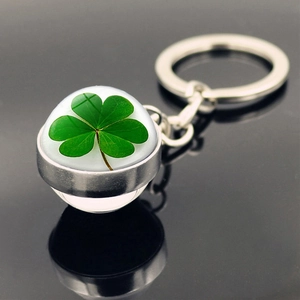 Lucky four-leaf clover keychain with a double-sided crystal ball on a silver metal ring
