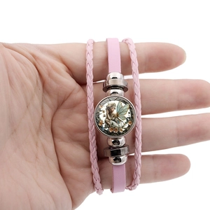 Vintage-Armband in Rosa mit Engel-Fee-Anhänger und mehrlagigen geflochtenen Bändern