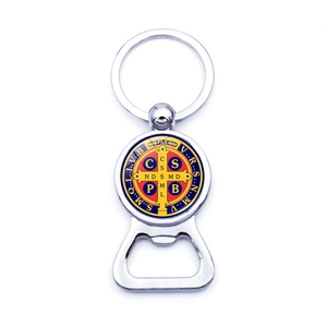 Detail of silver St. Benedict Medal keychain with integrated bottle opener function