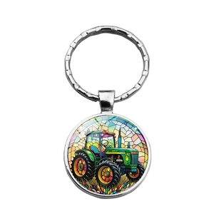 Porte-clés rond en métal avec illustration de tracteur vert au style vitrail