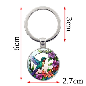 Porte-clés dôme en verre colibri et fleurs avec anneau en métal argenté et design créatif