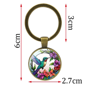 Porte-clés vintage en bronze avec pendentif colibri et détails des dimensions