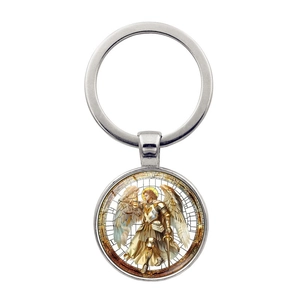 Macro shot of Archangel Michael religious glass pendant with silver stainless steel ring