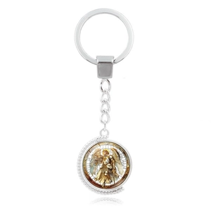 Detail of Archangel Michael rotating pendant keychain with silver metal finish