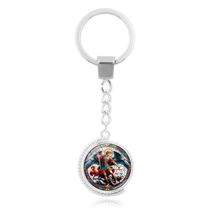 Polished silver metal keychain featuring St. Michael battling the dragon design