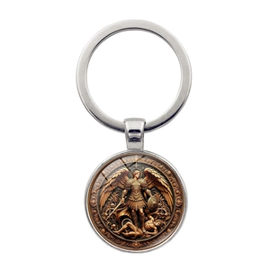 Detailed close-up of Archangel Michael religious medallion keychain in bronze finish