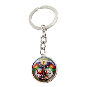 Close-up of Archangel Michael religious glass cabochon keychain with silver alloy ring