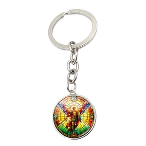 Detail of Archangel Michael glass cabochon pendant on polished silver metal keychain