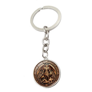 Archangel Michael metal keychain with round religious art pendant on a white background