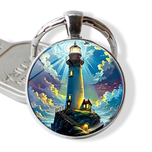 Detailed macro view of a silver alloy keychain with a colorful lighthouse glass dome pendant