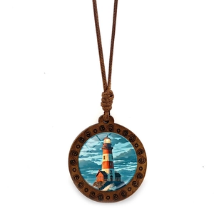 Detailed view of lighthouse landscape pendant with wood frame and brown woven cord