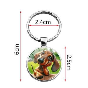 Cute dachshund puppy glass cabochon keychain with silver metal ring on white background