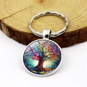 Artistic colorful Tree of Life keychain with glass dome pendant on wooden base