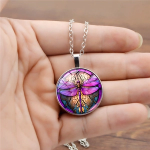 Minimalist vintage silver necklace featuring a colorful dragonfly glass art pendant