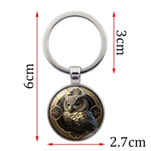 Portachiavi vintage con gufo in vetro e metallo argento con lunghezza 6cm e anello da 3cm
