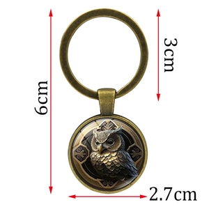 Portachiavi con gufo vintage in vetro bronzo con misure di 6cm di lunghezza totale
