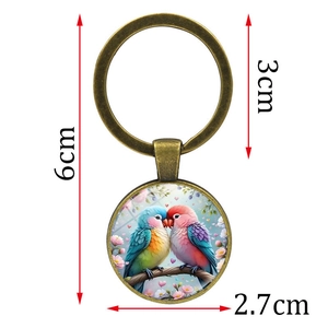 Porte-clés perroquet inséparable en verre avec dimensions 6cm de long et 3cm de diamètre