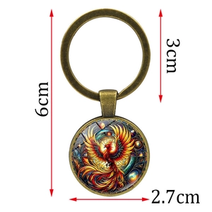 Artistic phoenix pendant keychain in bronze finish with glass dome and 2.7cm charm
