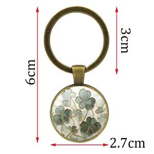 Fashion four-leaf clover metal keychain pendant in bronze finish with 6cm total length
