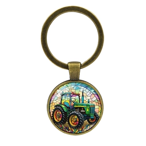 Vintage metal tractor keychain with colorful stained glass style circular pendant