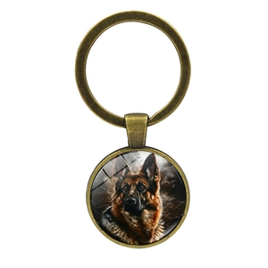 Vintage bronze keychain with round glass pendant featuring a realistic German Shepherd dog