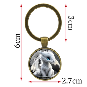 Vintage bronze keychain with white dragon glass gem pendant and sizing specifications
