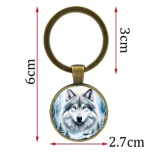 Antique bronze keychain with 2.7cm blue-eyed snow wolf glass cabochon pendant