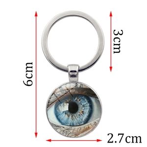 Porte-clés avec cabochon œil bleu réaliste en métal argenté d'une longueur de 6 cm