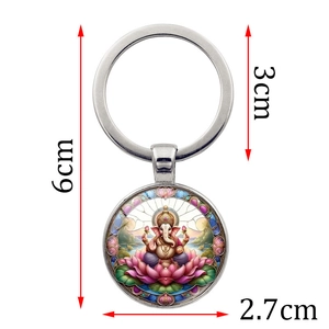 Silver metal keychain featuring a colorful Ganesha glass pendant for car bags