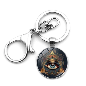 Silver Eye of Horus keychain with glass pendant and metal lobster clasp on white background