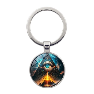 Porte-clés œil d'Horus égyptien en métal avec design mystique de pyramide et ciel étoilé