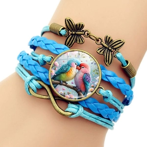 Bracelet multicouche bohème avec symbole infini et pendentif médaillon oiseaux bleus