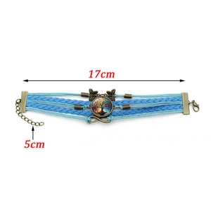 Détails du bracelet en cuir tressé avec arbre de vie et breloques infini et papillon