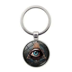 Porte-clés en argent avec le symbole de l'Oeil de la Providence sous dôme en verre