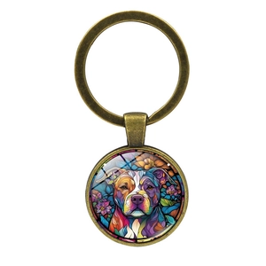 Vintage bronze dog keychain featuring colorful artistic pop art bull dog illustration