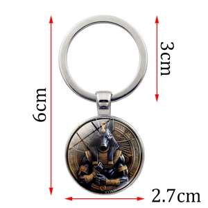 Porte-clés dieu égyptien Anubis en métal avec pendentif en verre de 2,7 cm de diamètre