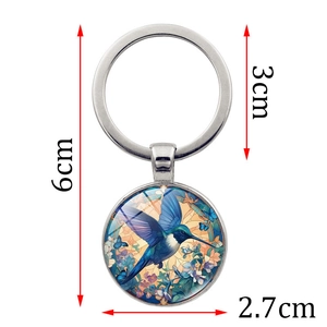 Vintage hummingbird pendant keychain with glass dome and 6cm total length measurements