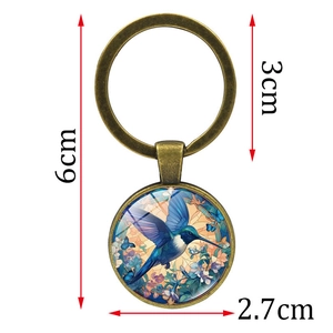 Vintage hummingbird glass dome keychain in bronze finish with product size measurements