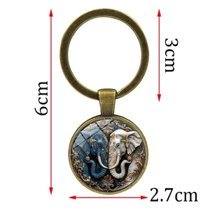 Vintage bronze elephant glass dome keychain showing 6cm total length and 3cm ring size