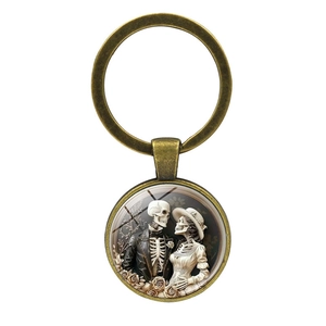 Vintage bronze skull couple glass cabochon keychain for gothic bags and accessories